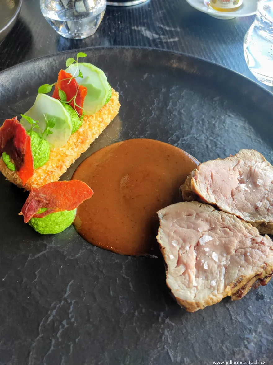 Mlýnec Restaurant: veal tenderloin with polenta, broccoli, a prosciutto chip, and mushroom sauce.
