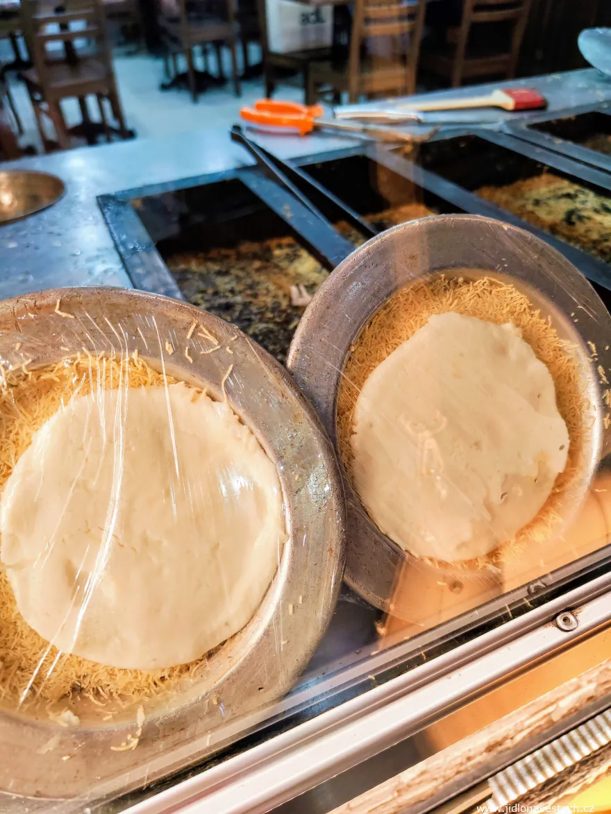 Künefe: pre-prepared layer of kadayıf noodles and cheese.