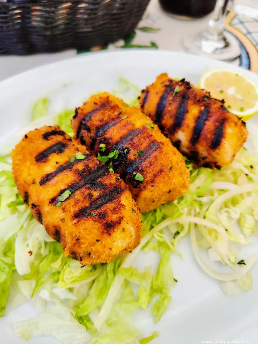 Involtini di pesce spada - grilled swordfish rolls on a salad. Involtini di pesce spada - grilled swordfish rolls on a salad.