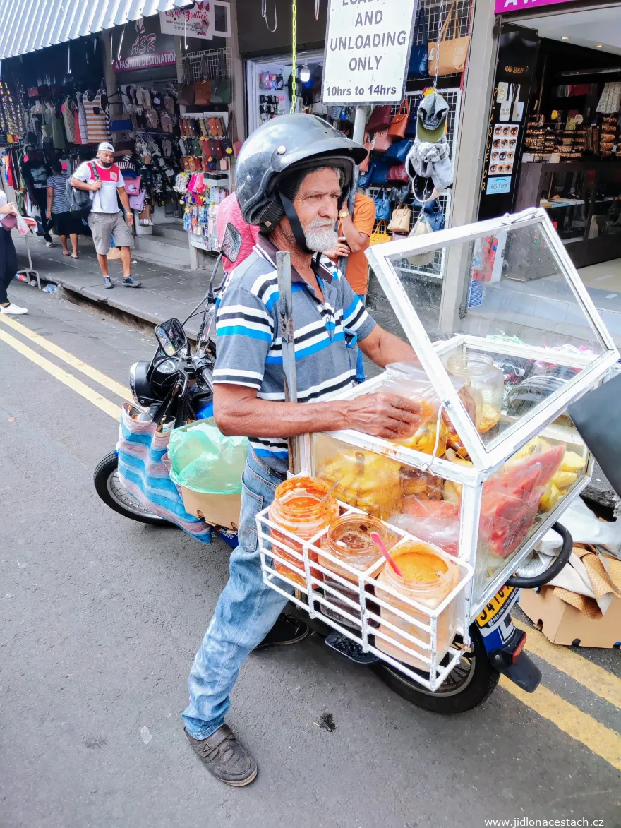 Seller of pickled fruit Seller of pickled fruit