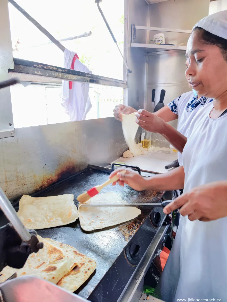 Preparing paratha flatbreads Preparing paratha flatbreads
