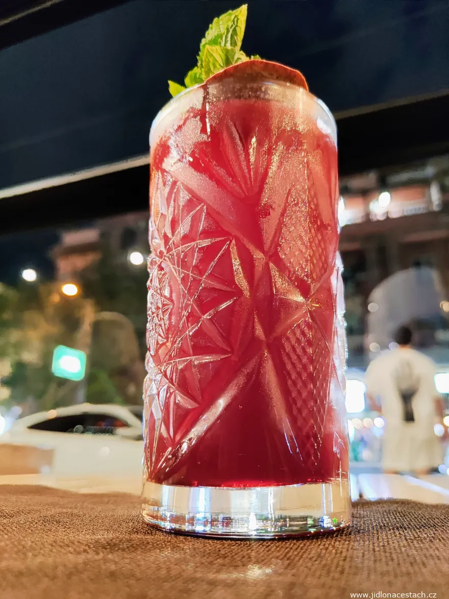 Armenian cocktail Nrneni - gin, tonic, freshly squeezed pomegranate juice, pomegranate syrup, and lemon juice