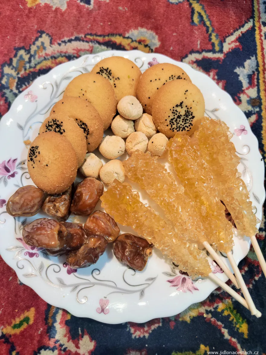 Nabat, Iranian cookies (nan-e berenji, haji badam), and figs. Nabat, Iranian cookies (nan-e berenji, haji badam), and figs.