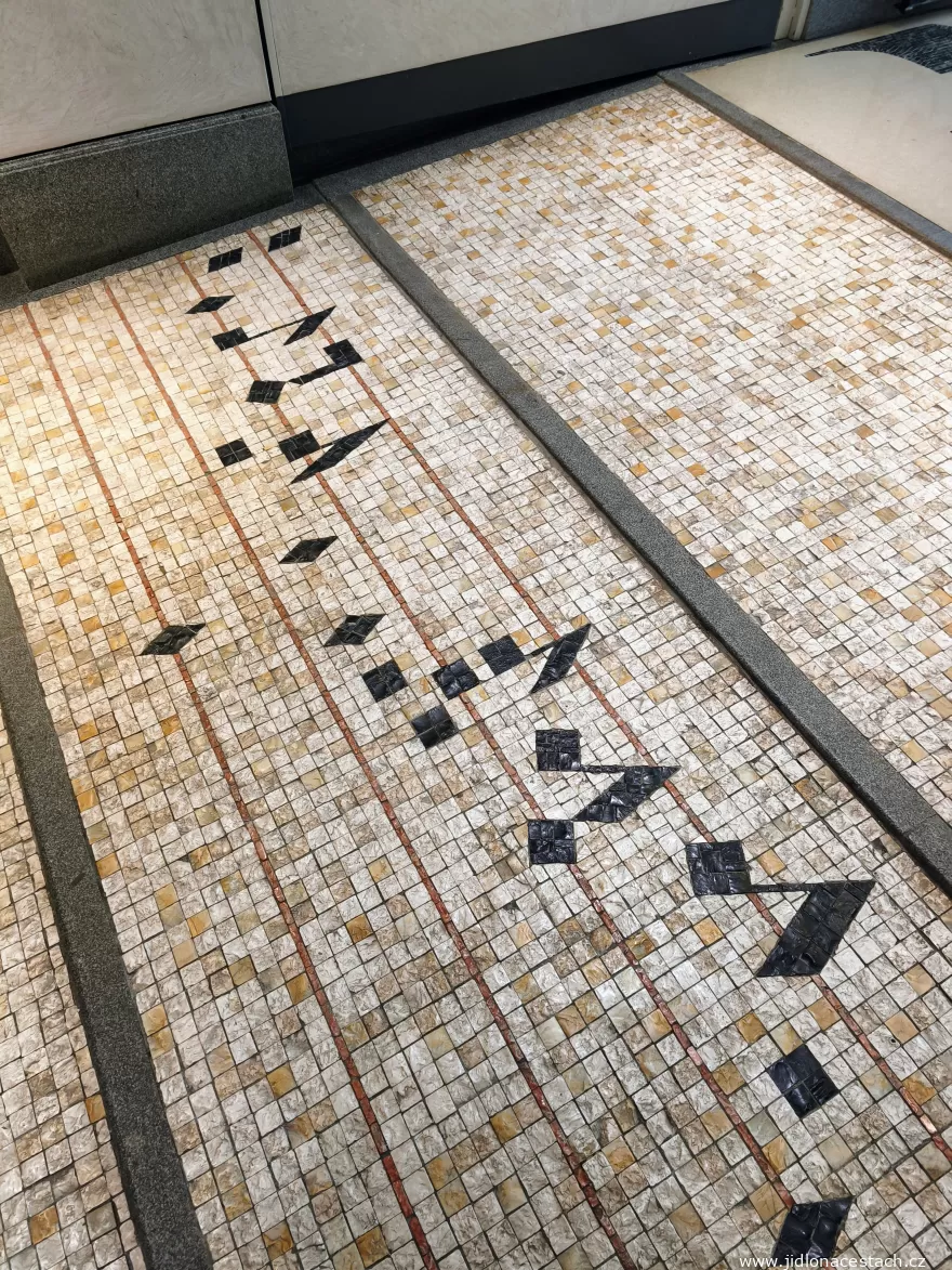 Coda: the floor mosaic with a musical staff. Coda: the floor mosaic with a musical staff.