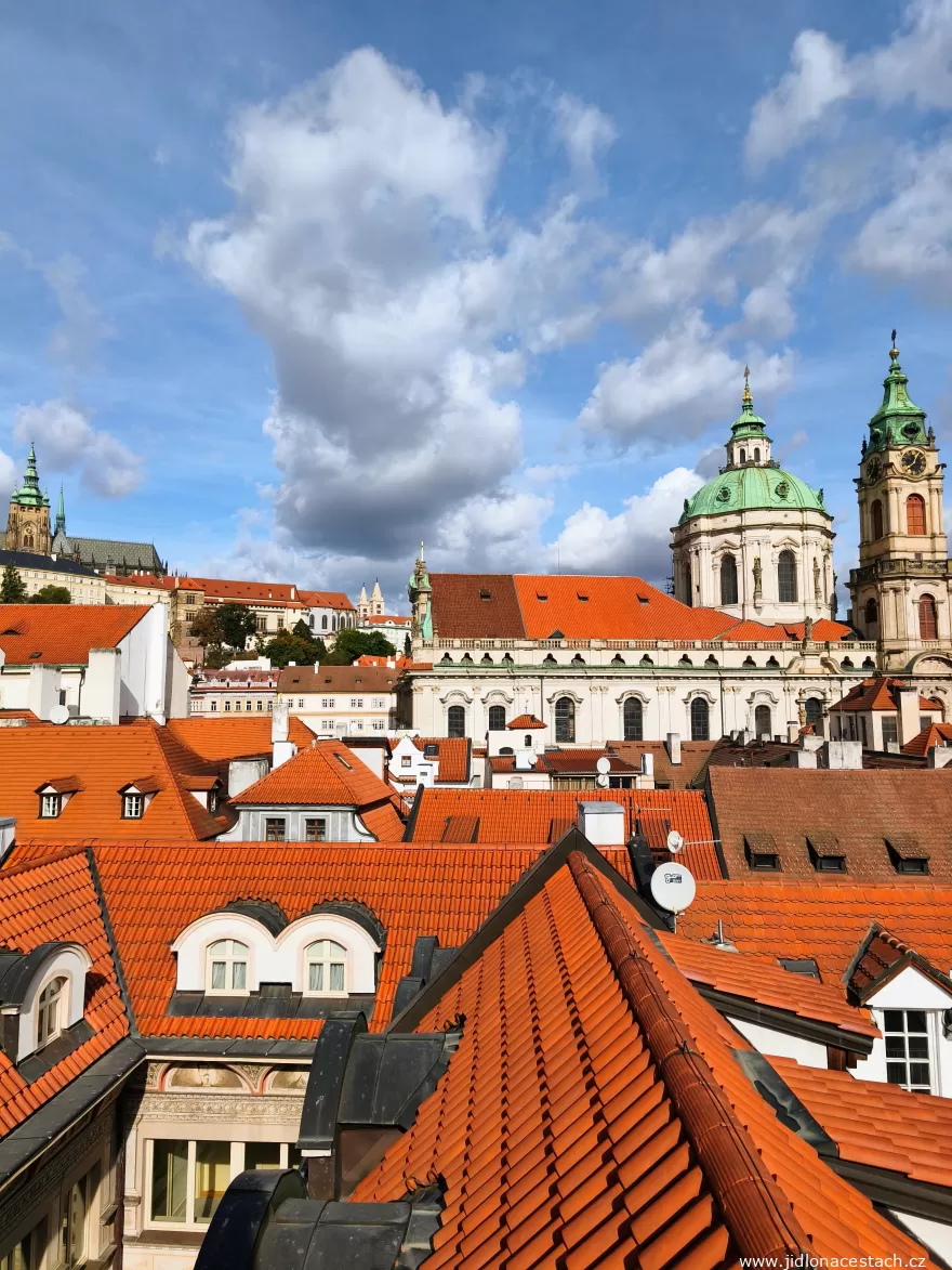 Coda: the view from the terrace over the rooftops of Malá Strana and Prague Castle.