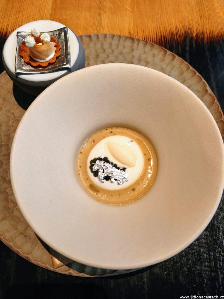 Field Restaurant: caviar with light Gran Moravia foam, almond cream, buttermilk ice cream, Jerusalem artichoke sauce, and elderflowers.