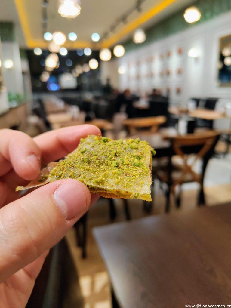 Katmer: the whole dessert is cut into smaller squares before consumption.